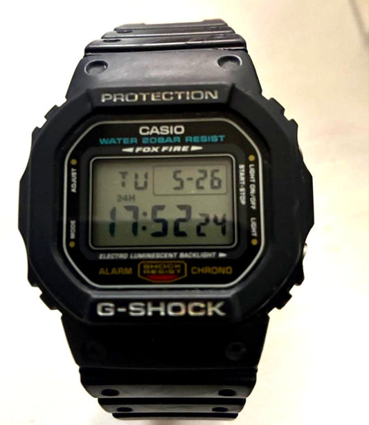Casio G-Shock black digital wristwatch with backlight and durable design
