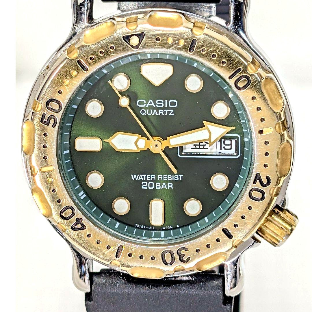 Casio Dive MD718 men’s watch with black dial, new unbranded band, and polished stainless steel case