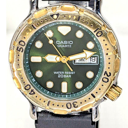 Casio Dive MD718 men’s watch with black dial, new unbranded band, and polished stainless steel case