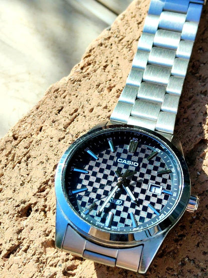 Casio MTP-VD03 quartz watch with deep blue checkered lacquered dial and stainless steel case