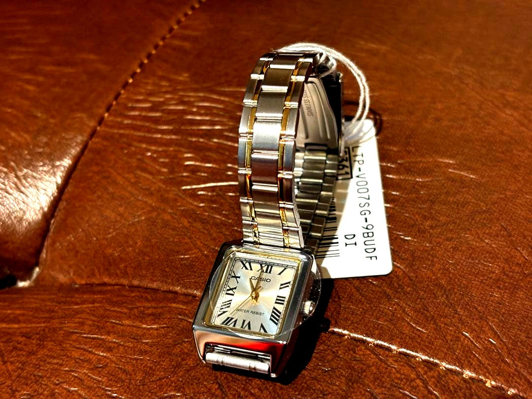 Casio LTP-V007SG-9B square analog watch with silver brass case and gold stainless steel band