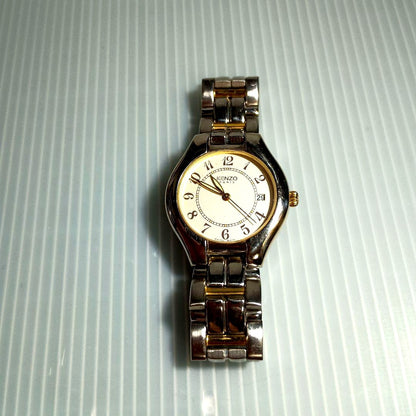 Kenzo Swiss Made silver and gold analogue wristwatch with metal band and luminescent hands