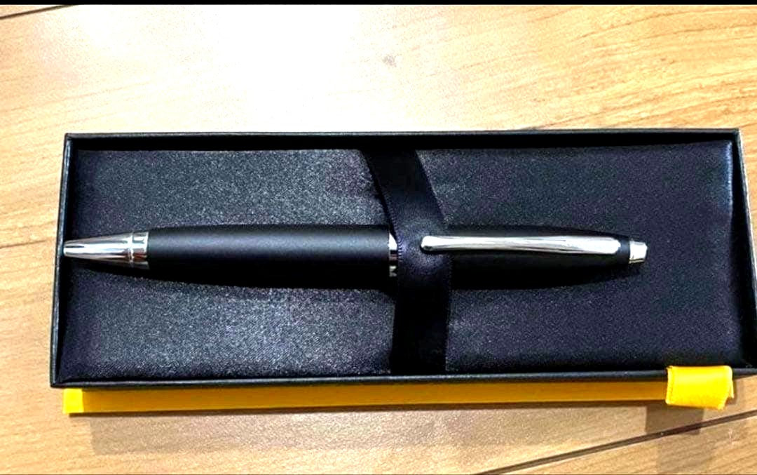 Cross black metal ballpoint pen with dedicated case on white background