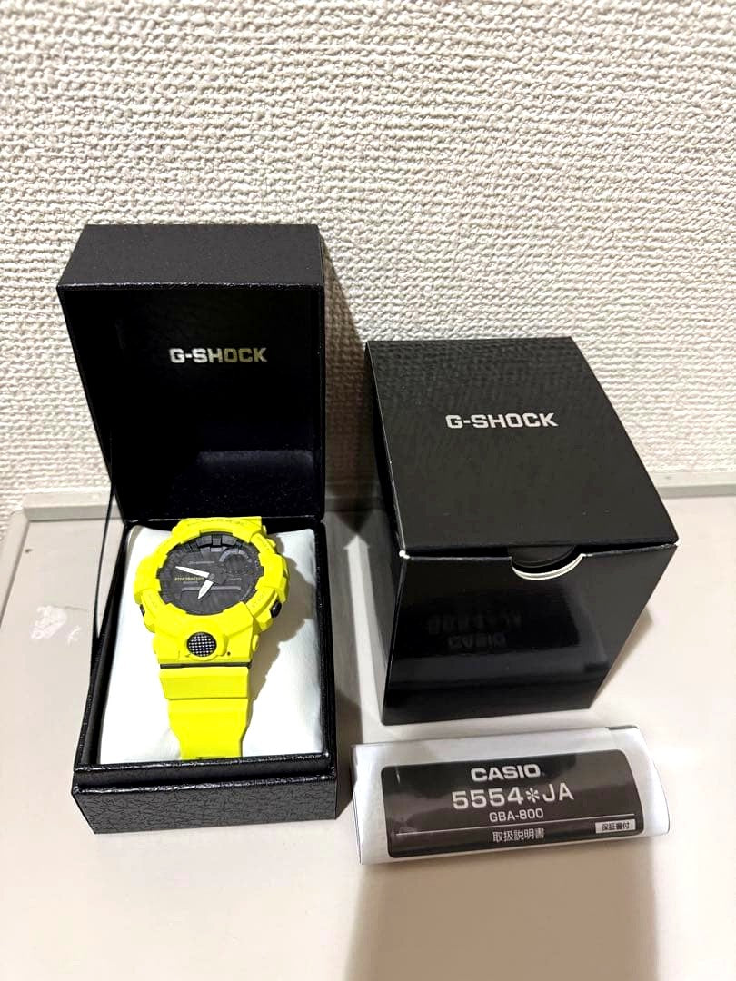Yellow G-Shock GBA-800 Bluetooth watch with yellow band and digital-analog display, boxed and unused