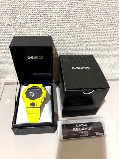 Yellow G-Shock GBA-800 Bluetooth watch with yellow band and digital-analog display, boxed and unused
