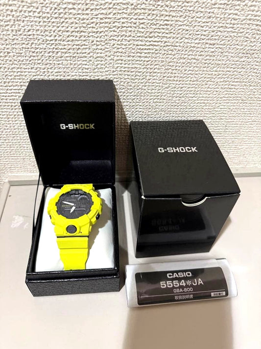 Yellow G-Shock GBA-800 Bluetooth watch with yellow band and digital-analog display, boxed and unused