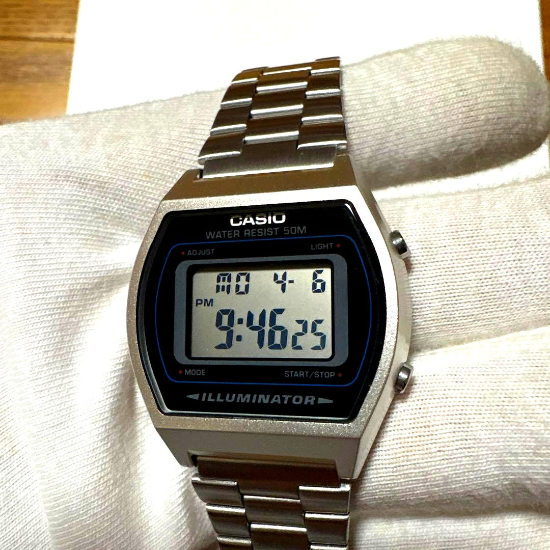 Casio W-202 digital watch with illuminator feature, black band, brand new protective film on glass