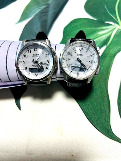 Casio Lineage Wave Captor quartz wristwatch with silver case, white dial, and black leather strap