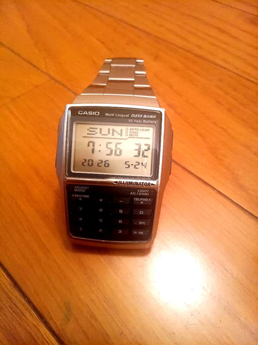 Casio Data Bank DBC32D-1A silver stainless steel digital watch with calculator and illuminator display