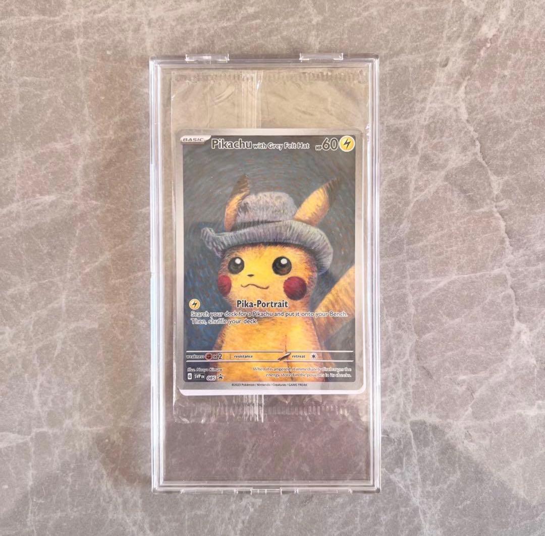 Unopened Gogh Pikachu figure wearing grey felt hat with minor white scratch on lower left side