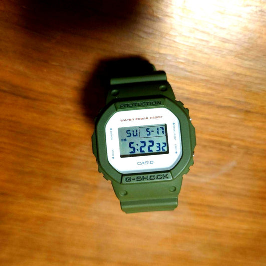 Casio G-Shock Series Digital Watch in olive green with digital display and waterproof feature