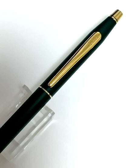 Vintage Cross Classic Century green and gold twist ballpoint pen with minor scratches and gold tarnish