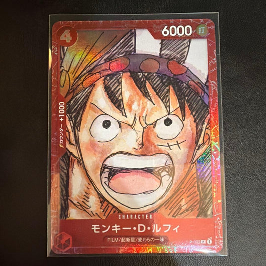 One Piece Monkey D. Luffy P-023 collectible card with colorful anime artwork