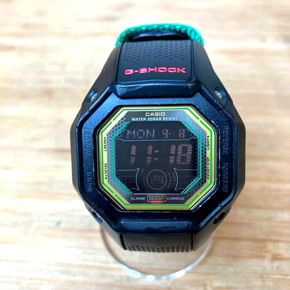 Casio G-Shock G-056RE digital wristwatch with black resin band and digital display showing time