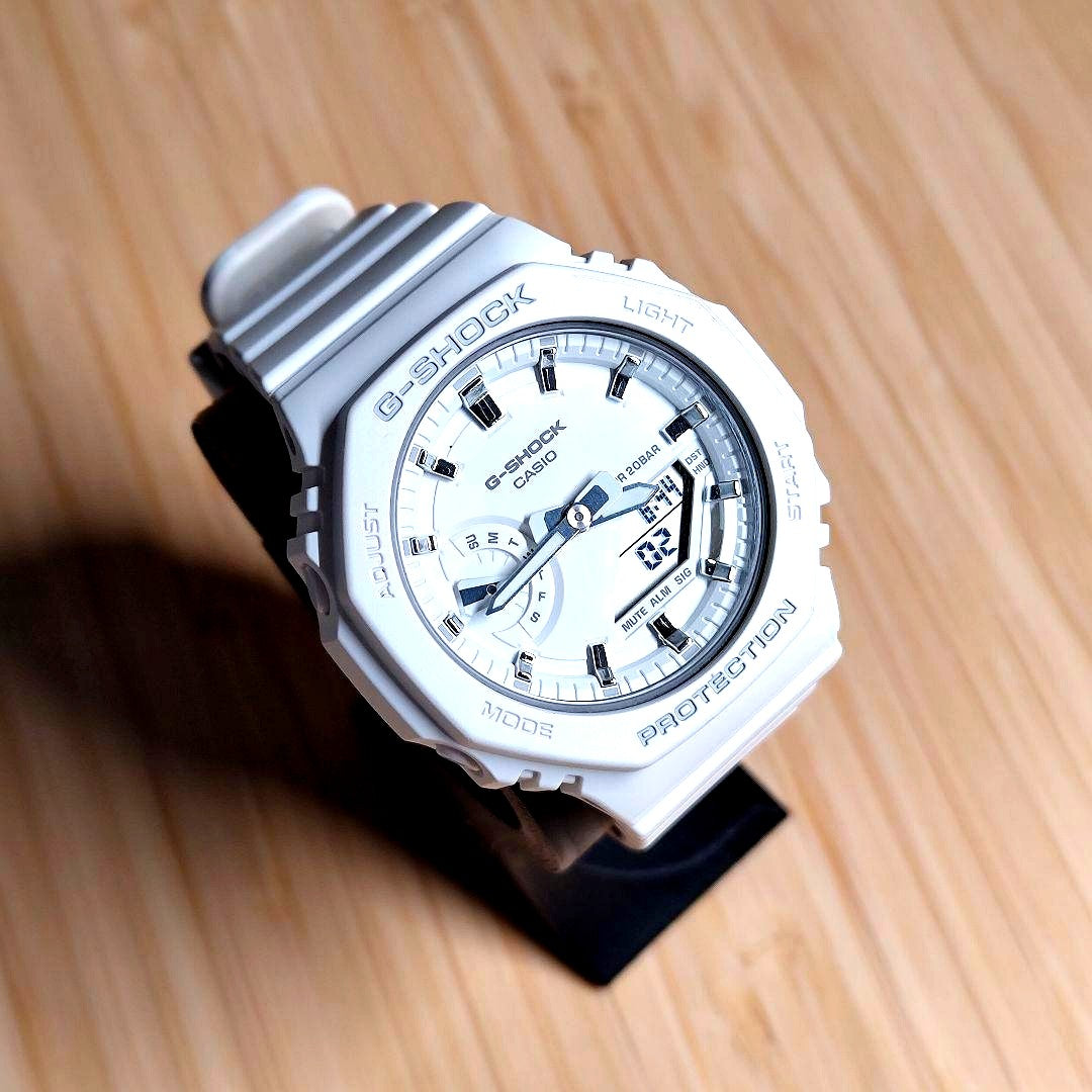 Casio G-Shock GMA-S2100-7AJF white watch with analog-digital display and minor bezel paint chip