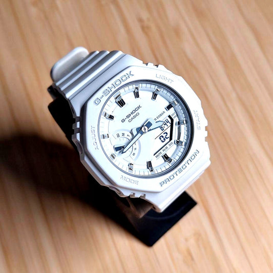 Casio G-Shock GMA-S2100-7AJF white watch with analog-digital display and minor bezel paint chip