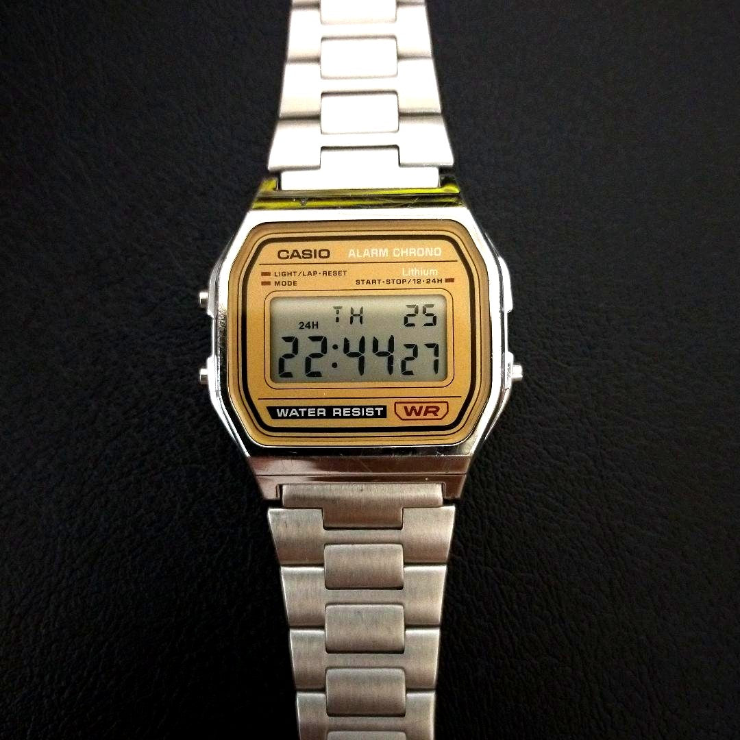 Casio A-158WEA-9JF stainless steel digital watch showing time on display