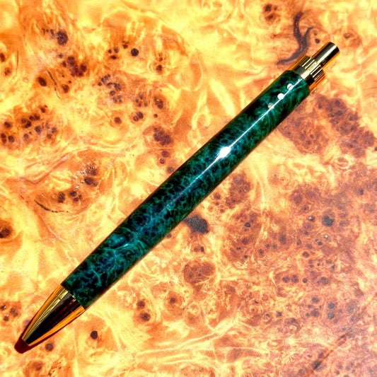 Koharu stabilized koa wood ballpoint pen with glossy lacquer finish and decorative abalone accents