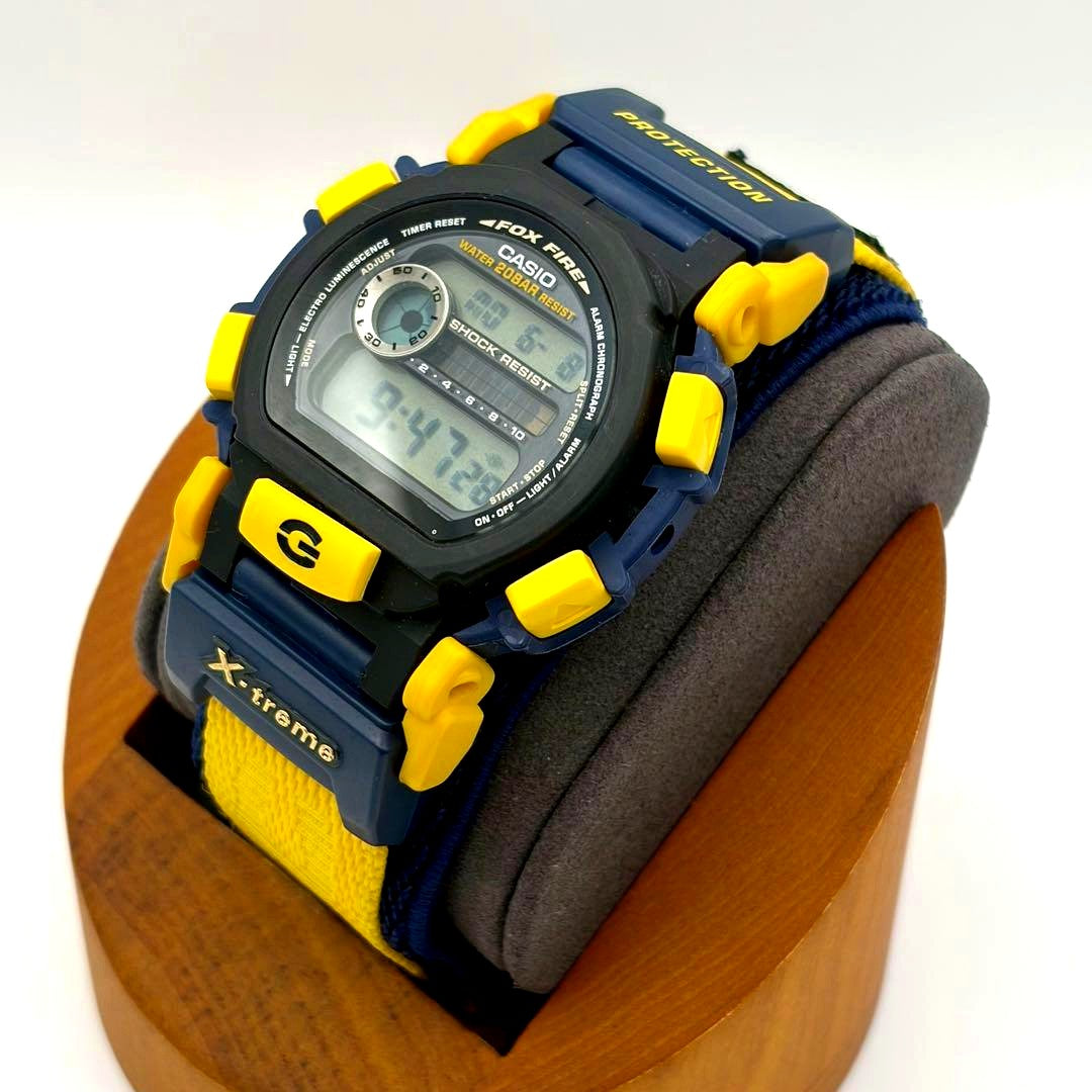 Casio G-Shock X-treme DW-003 1586 digital watch with missing bezel and visible wear