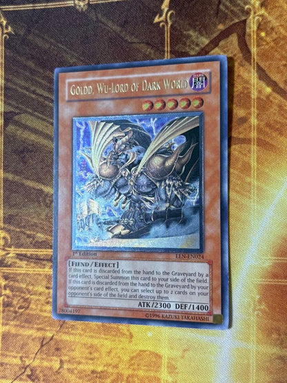 Yugioh Dark Lord of the Abyss Gold Edition 1st Relic card in English, showing minor chipping and scratches