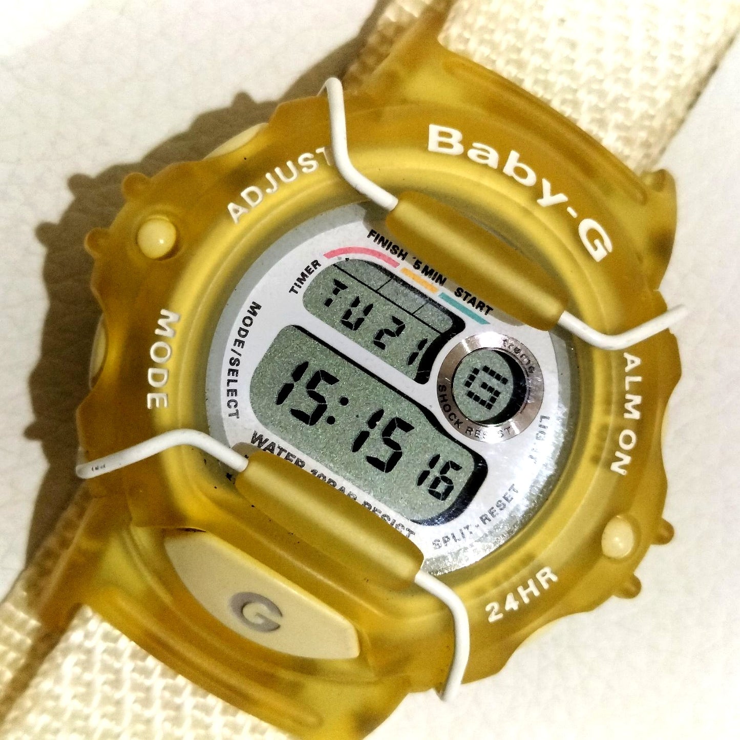 Casio Baby-G BG-340 digital watch in green and white with digital display and Japan import label