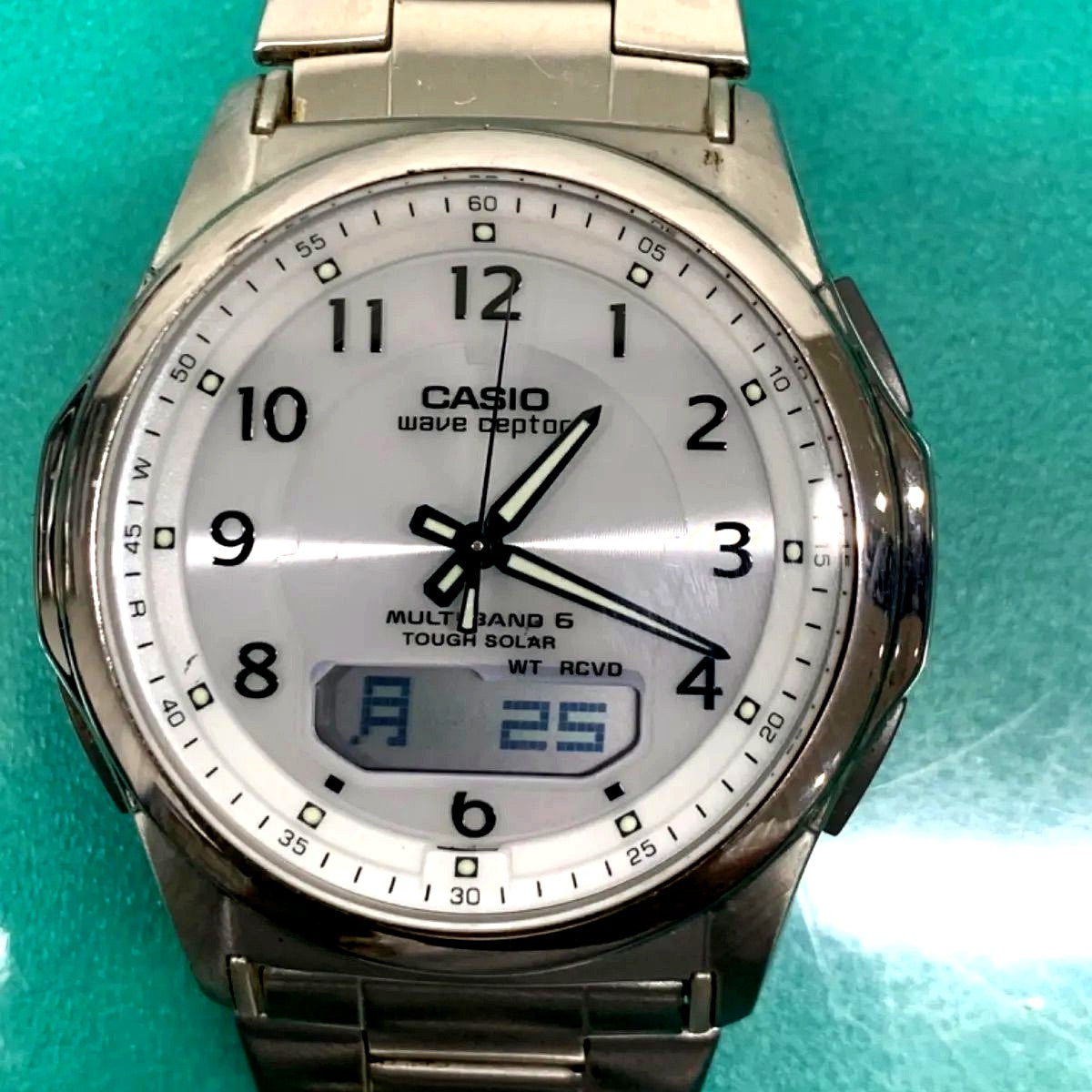 Used Casio WV3-M630 battery-operated watch with white dial showing minor scratches and wear